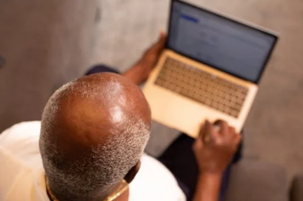 man using a laptop